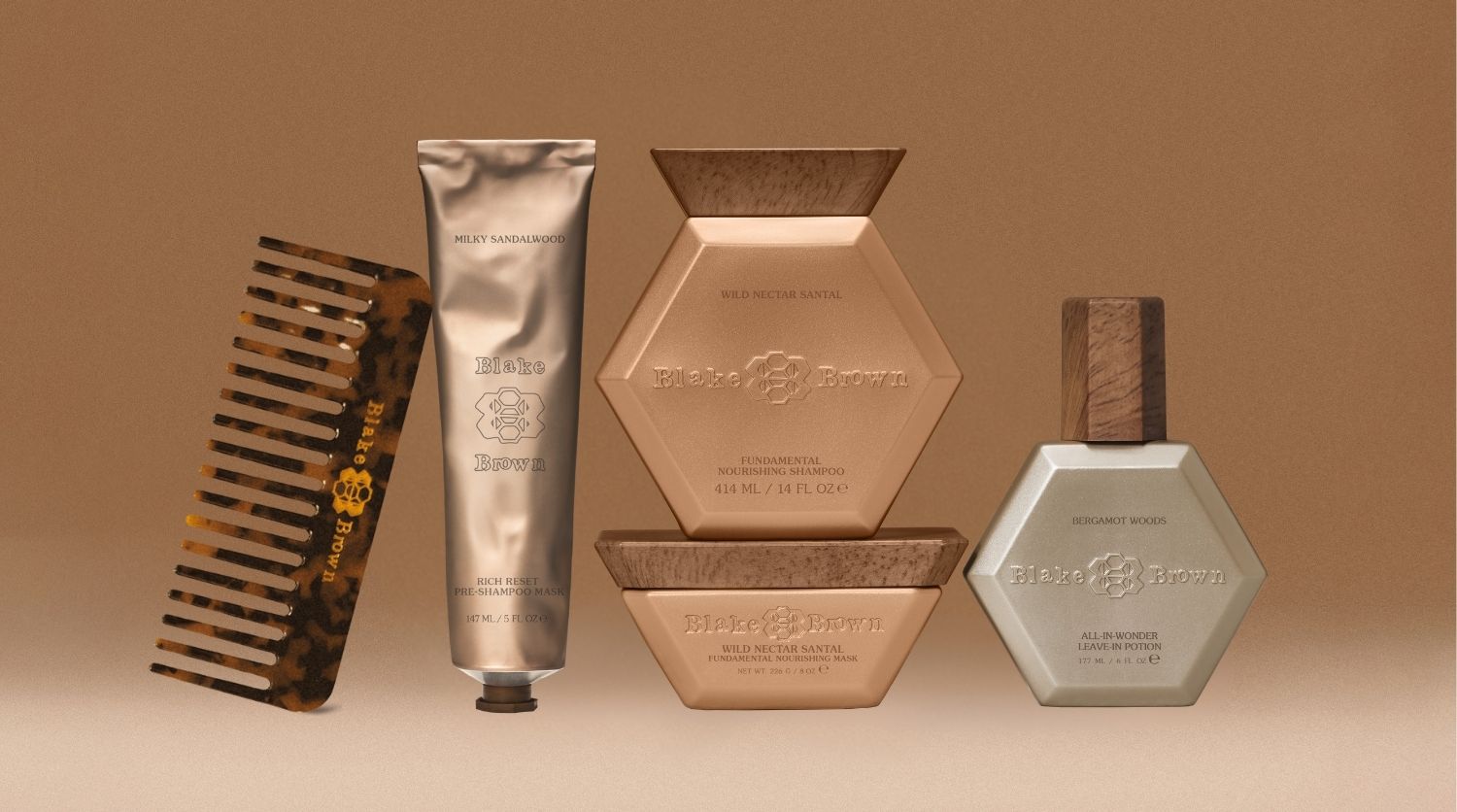 Blake Brown's Wavy Hair Essentials: a branded wide-tooth comb, Nourishing Shampoo and Mask duo, Pre-Shampoo Mask, and the Leave-In Potion.